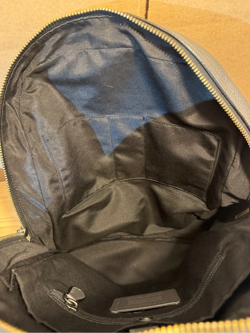 Coach Men's Gray Leather Backpack with Blue Stripe